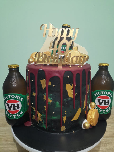 Tall Cake with Alcohol Bottles