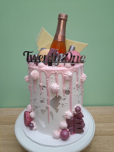 Tall Cake with Champagne Bottle