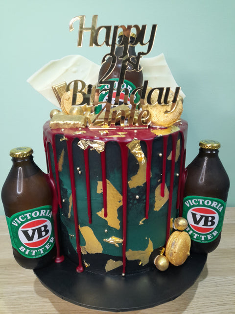 Tall Cake with Beer Bottles
