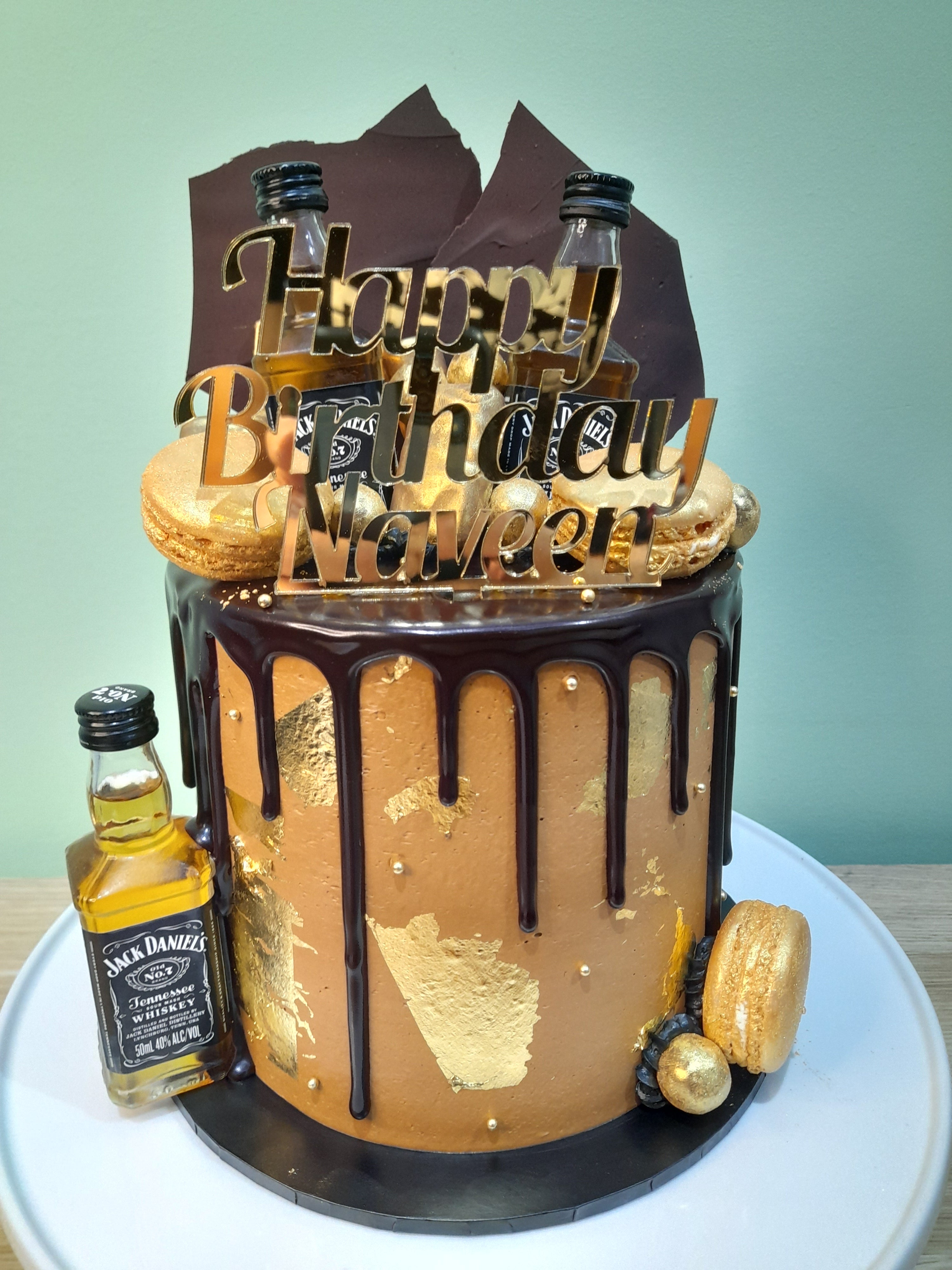 Liquor cake with mini alcohol bottles | Alcohol birthday cake, Liquor cake, Alcohol  cake