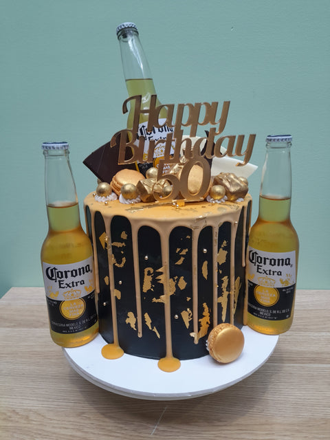 Tall Cake with Beer Bottles