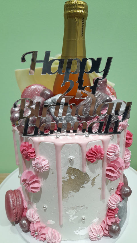 Tall Cake with Champagne Bottle